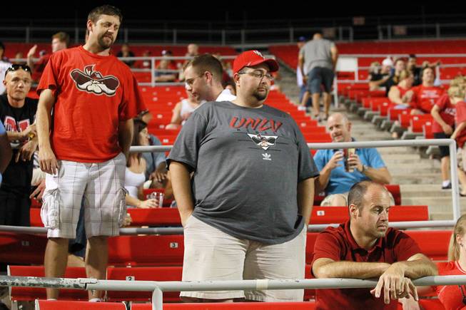 UNLV fans react as a Rebel drive ends just short of the end zone late in the fourth quarter of their game against Washington State Friday, Sept. 14, 2012 at Sam Boyd Stadium. Washington State won the game 35-27, dropping UNLV to 0-3 on the season.